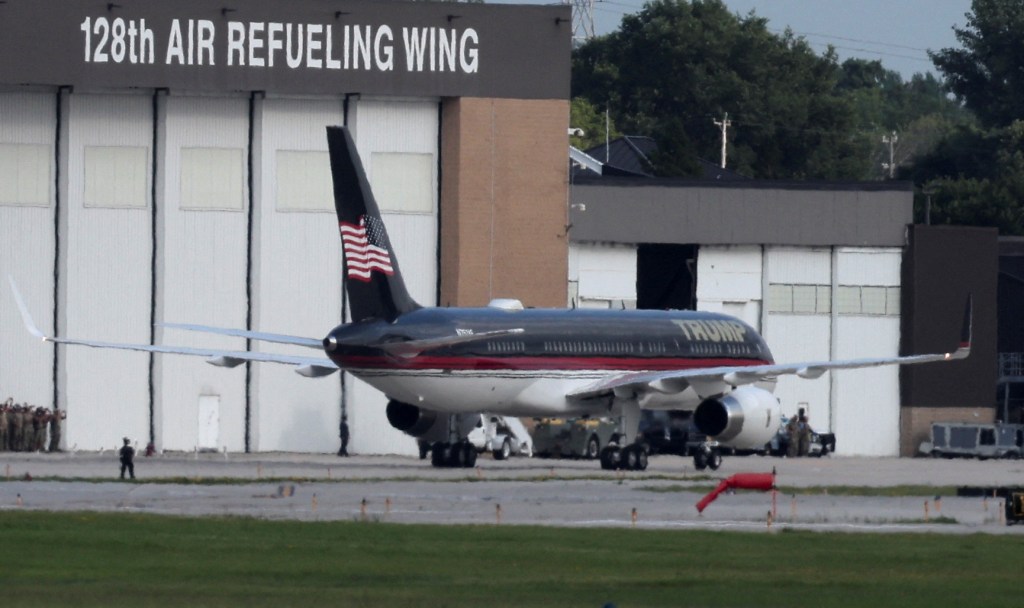 Trump lands in Milwaukee for RNC on day after assassination attempt