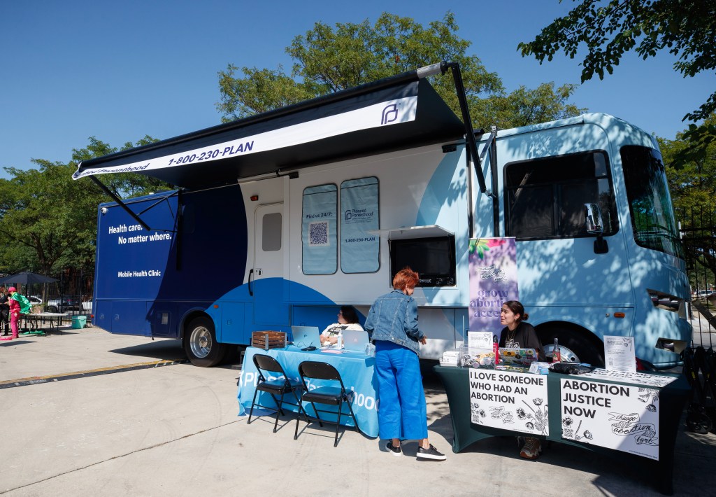 Pro-life advocates counter Planned Parenthood truck offering vasectomies, abortions outside DNC with free diapers