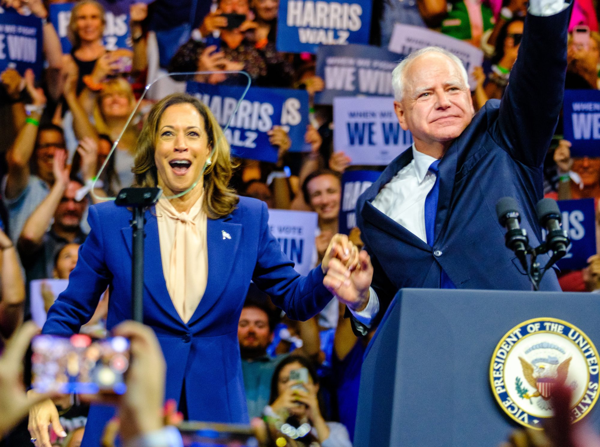 Harris and Walz host first Midwest rally on first full day as Dem ticket