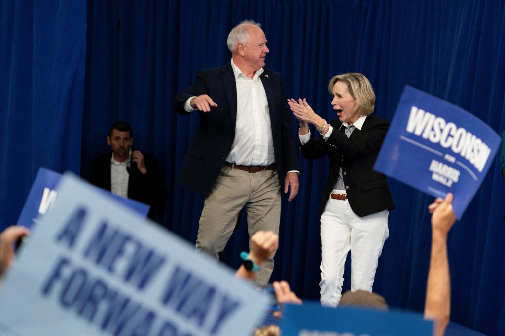 Tim Walz’s wife sparks groans with anti-Trump hand gesture at rally: ‘Worse than Hillary’