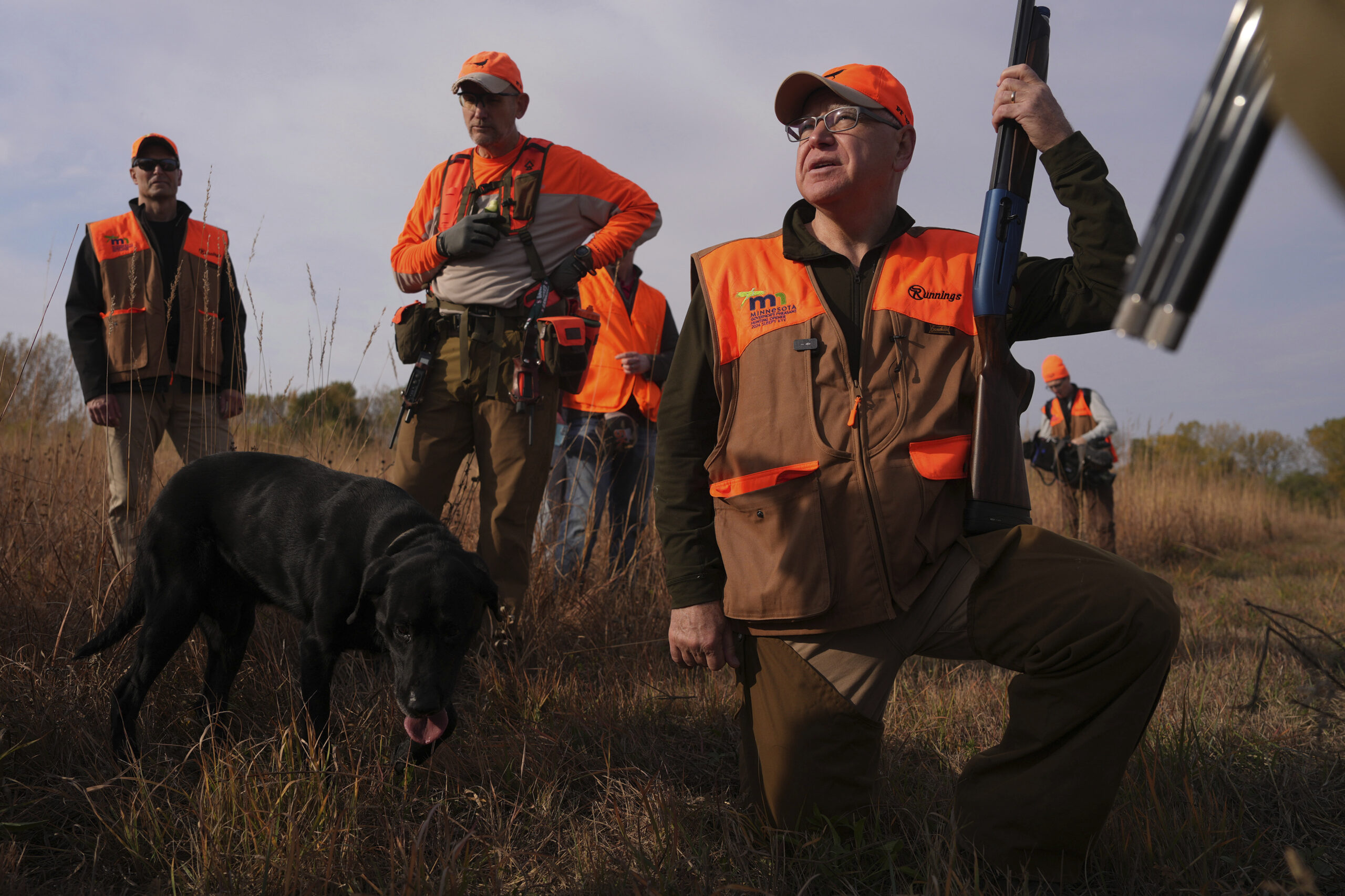 Tim Walz roasted over appearing to struggle to load shotgun at hunting event: ‘So much for being military badass’