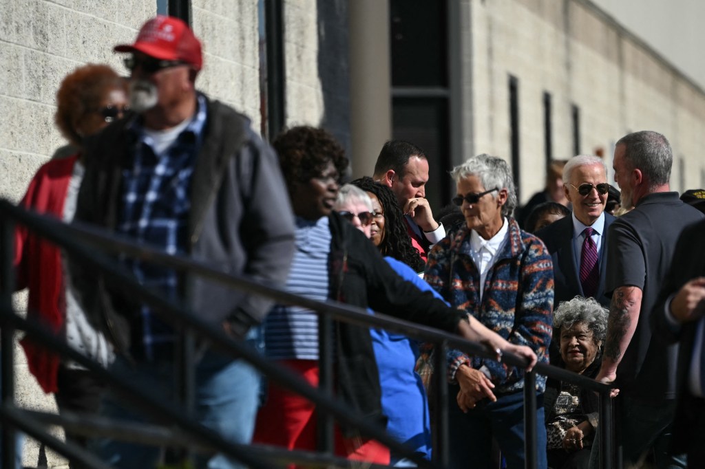 Biden stands in line to vote behind man in profane pro-Trump hat: ‘Elect that motherf—er again’