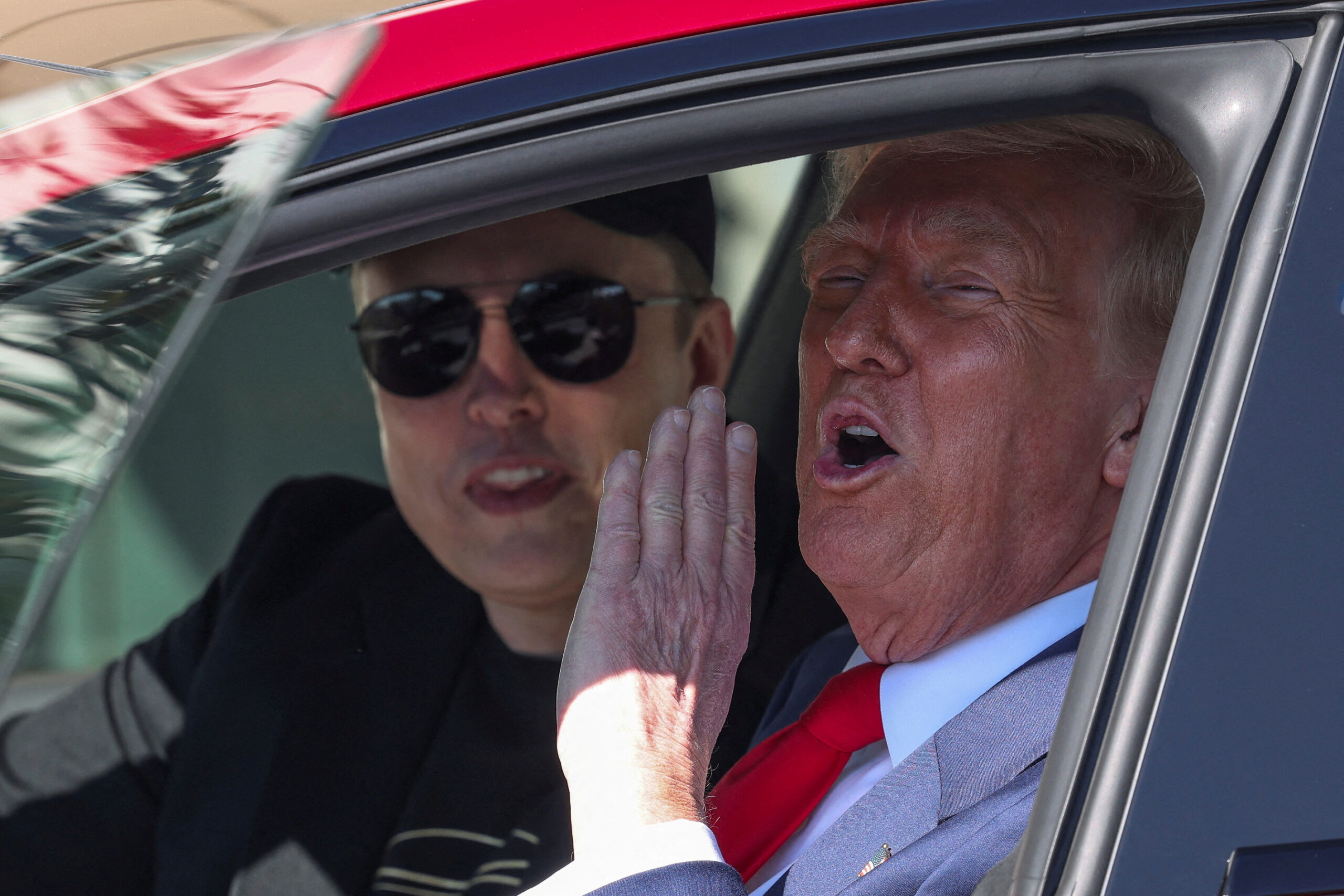 Trump commits to buying red Tesla in White House driveway to support ‘incredible patriot’ Elon Musk